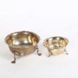 A graduated pair of small silver bowls