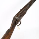An Antique percussion rifle with ramrod, length 137cm