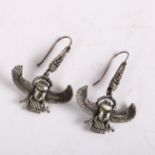 A pair of Egyptian silver scarab beetle earrings, on shepherd hook fittings, earring height 44mm,