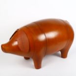 A large tan leather figural pig foot stool, in the manner of Liberty, unmarked, length 70cm