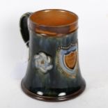 A Royal Doulton stoneware tankard with Richmond Rifle Club shield, 13cm