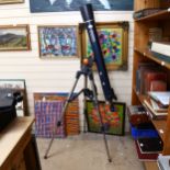 A Celestron Astromaster 90 telescope and tripod