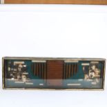 A Vintage display case with various cigars displayed, display includes pictures of various famous