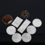 A tigers eye and silver-mounted brooch, and 7 mother-of-pearl counters
