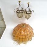 A pair of baguette chandeliers with glass lustres, and a Capiz shell ceiling lampshade