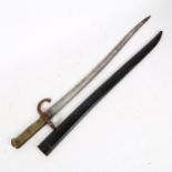 Antique bayonet in scabbard, with turned brass handle, 70cm