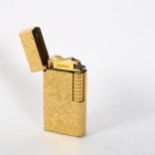 A Vintage gold plated Dunhill London lighter