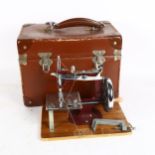 Essex miniature sewing machine, 1950s, with original guarantee and instruction manual, in carry case