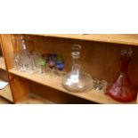 A harlequin set of overlay Sherry glasses, 2 decanters, and a water set