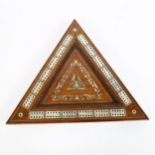 A Victorian rosewood and mother-of-pearl inlaid triangular cribbage board, the underside of board