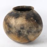 A large African pottery cooking pot, height 20cm