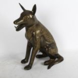 An Egyptian cast-brass jackal with engraved decoration, height 34cm