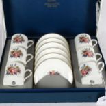 A boxed set of Royal Worcester coffee cans and saucers