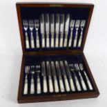 A silver plated dessert service for 12 people, with engraved blades and mother-of-pearl handles,
