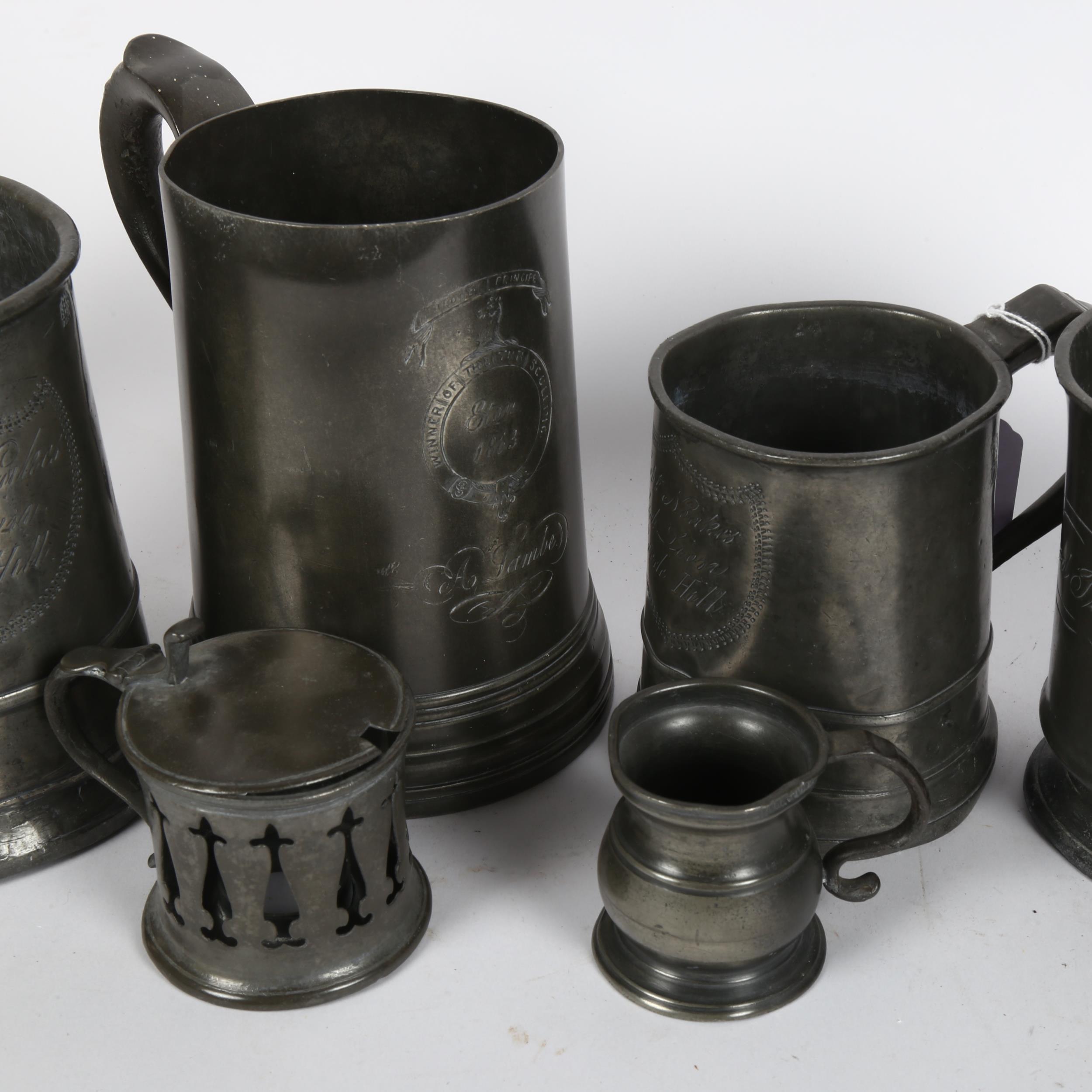 A group of 19th century pewter, including large tankard inscribed "Winner of the Tub Sculling Eton - Image 2 of 2