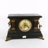 A 2-train mantel clock, in ebonised wood case with gilt-metal mounts