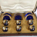 A set of 6 enamelled and gilded glass cabinet cups and saucers, in presentation box