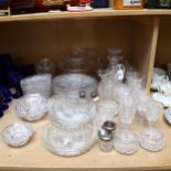 A suite of glassware, including decanters, goblets, salts, silver-topped bottles etc