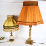 Classical design table lamp, on onyx plinth with orange shade, height 79cm, and a smaller