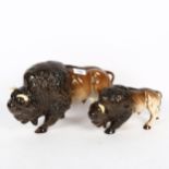 A graduated pair of Melba Ware bison, tallest 20cm