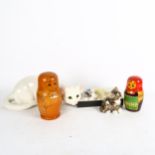 A Winstanley kitten, miniature tea sets, Russian dolls, and a white Just Cats figure