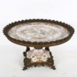 A large reproduction Chinese famille rose and ormolu-mounted table centre, width 42cm, height 24cm