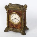 A German embossed brass-cased 8-day carriage clock, height 13cm