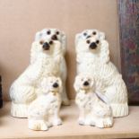 2 pairs of Edwardian Staffordshire mantel Spaniels, and a pair of Doulton Spaniels, height 14cm