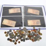 Various world coins, including United States dollar, album of world banknotes