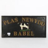 A cast-iron Plaz Newydd Babel dairy advertising sign, 29cm x 60cm