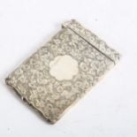 A Victorian silver card case, with allover scrolled and engraved decoration, hallmarks for