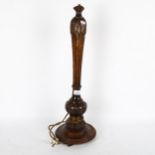 A carved wood table lamp, 62cm