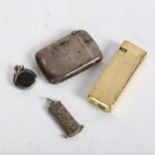A silver Vesta, a bloodstone and silver swivel fob, miniature silver-cased cigar cutter, and a