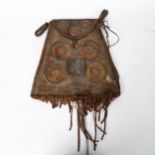 A Native American leather pouch, late 19th or early 20th century, with embroidered panels and
