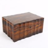 An Indian coromandel wood sewing box, shaped rectangular form with removeable insert, W26cm,