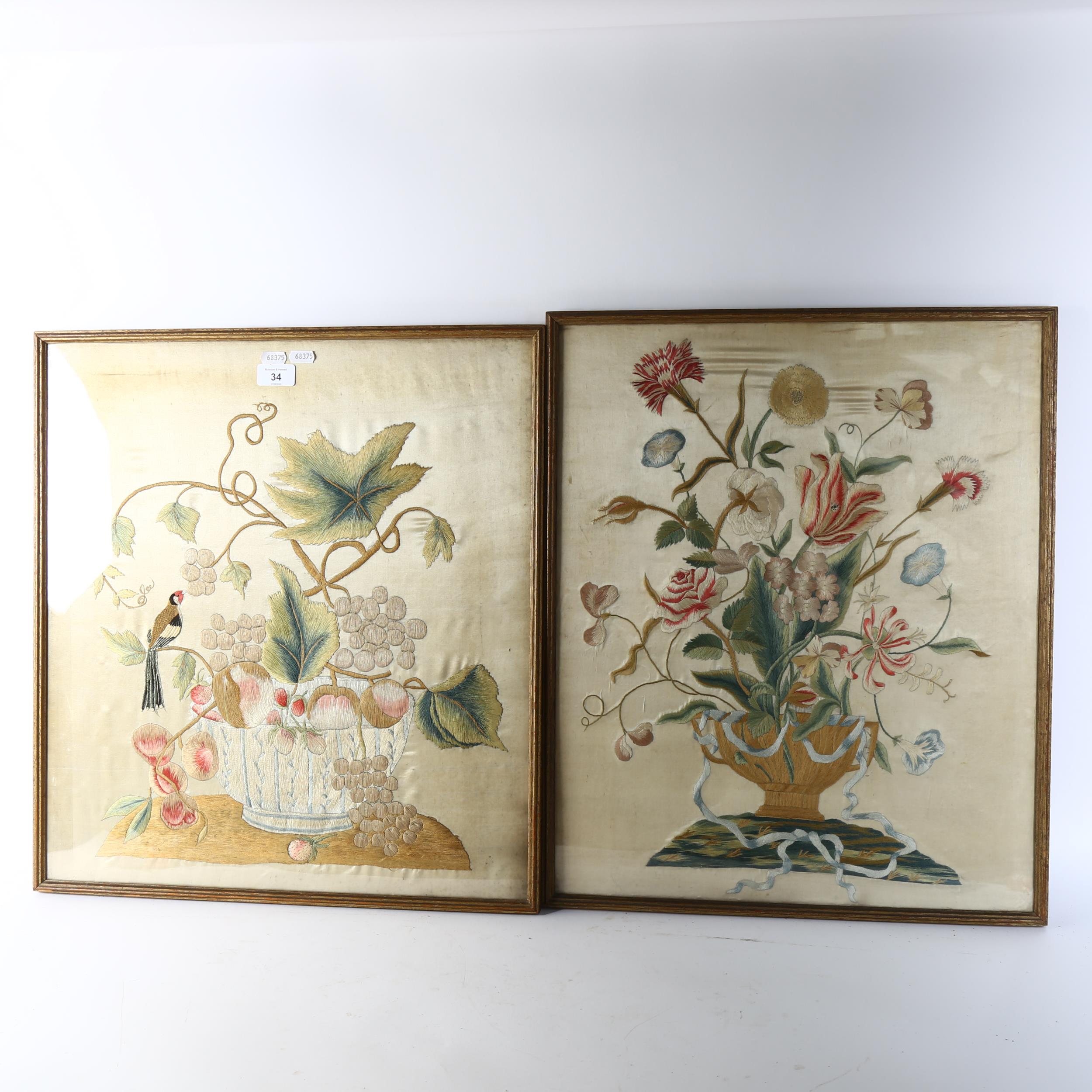 A pair of 19th century needlework embroidered silk panels, still life flowers, framed, overall