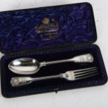 A Victorian silver Fiddle and Thread pattern spoon and fork, with shell embossed handles, in