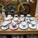 A group of 12 x 19th century and later moustache cups and saucers, including Hastings souvenir