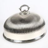 A large silver plated meat cover, half fluted form, height 28cm, width 48cm