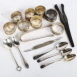 8 various silver napkin rings, silver-covered fruit knife, silver spoons etc