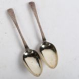 A pair of Georgian silver bright-cut tablespoons, with gilded bowls, with Newcastle hallmarks,