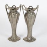 A pair of Art Nouveau aluminium vases, height 20cm