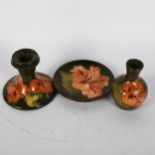 Moorcroft Hibiscus pattern candlestick, 8cm, matching vase and dish (3)