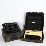 A Smith Premier Noiseless typewriter with case, and an Adler Junior 10 typewriter, also with case