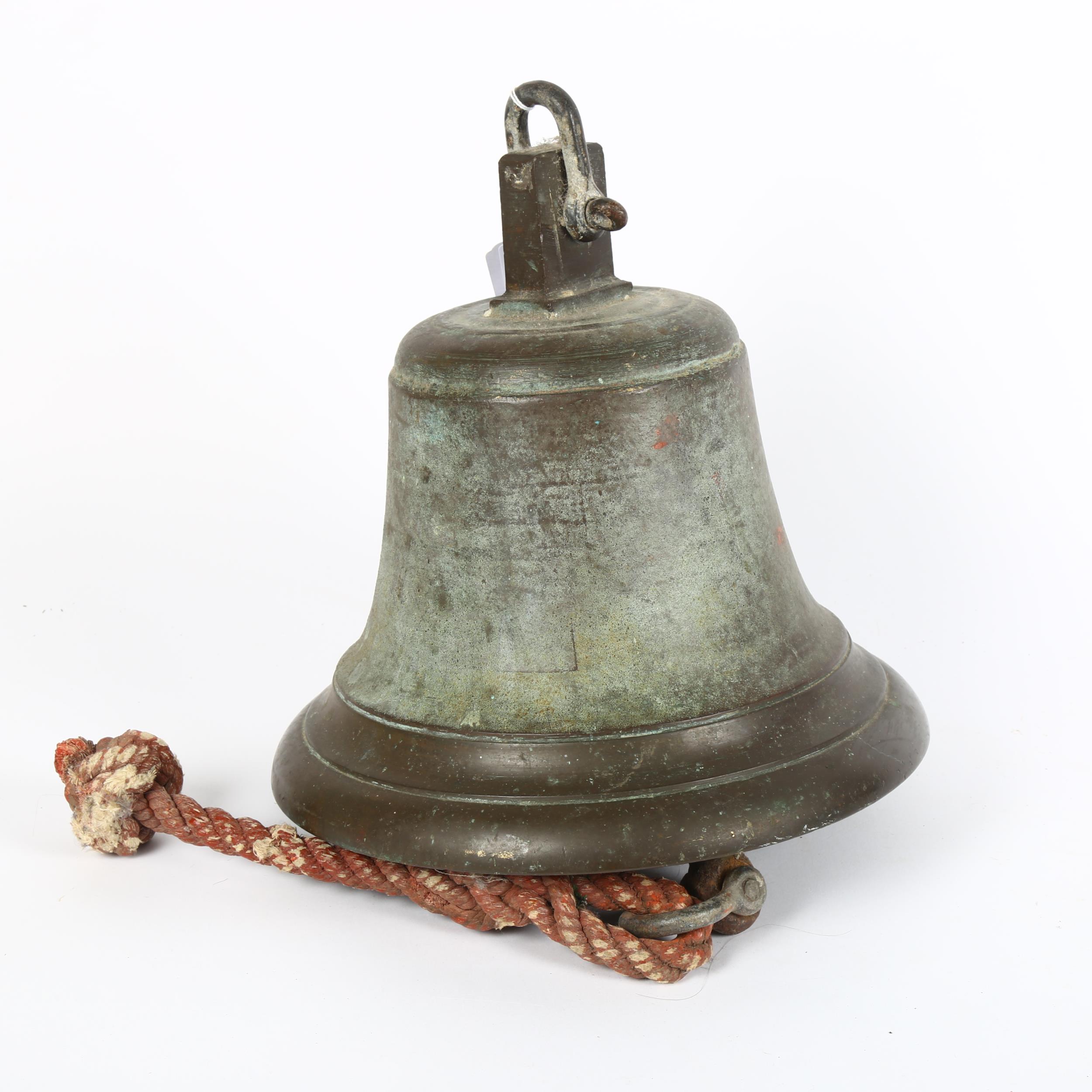 A heavy bronze bell, unmarked, diameter 26cm, height 26cm