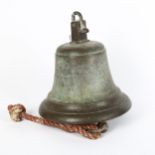 A heavy bronze bell, unmarked, diameter 26cm, height 26cm