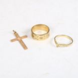 A 9ct gold engraved wedding band, a 9ct gold ring, and a 9ct gold cross (3), 6.3g