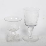 A 1935 George V engraved glass Jubilee goblet, 12cm, and another commemorative glass goblet