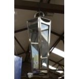 A modern storm lantern with candle, H50cm