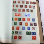 An album of GB and world stamps, including Penny Reds, Hong Kong, and India